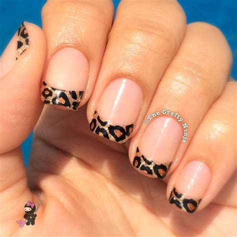 leopard print french tip nails.